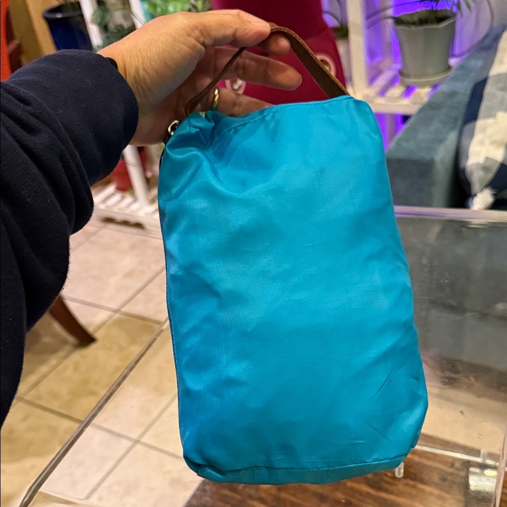 Longchamp Nylon Packable Raincoat; turquoise in excellent condition